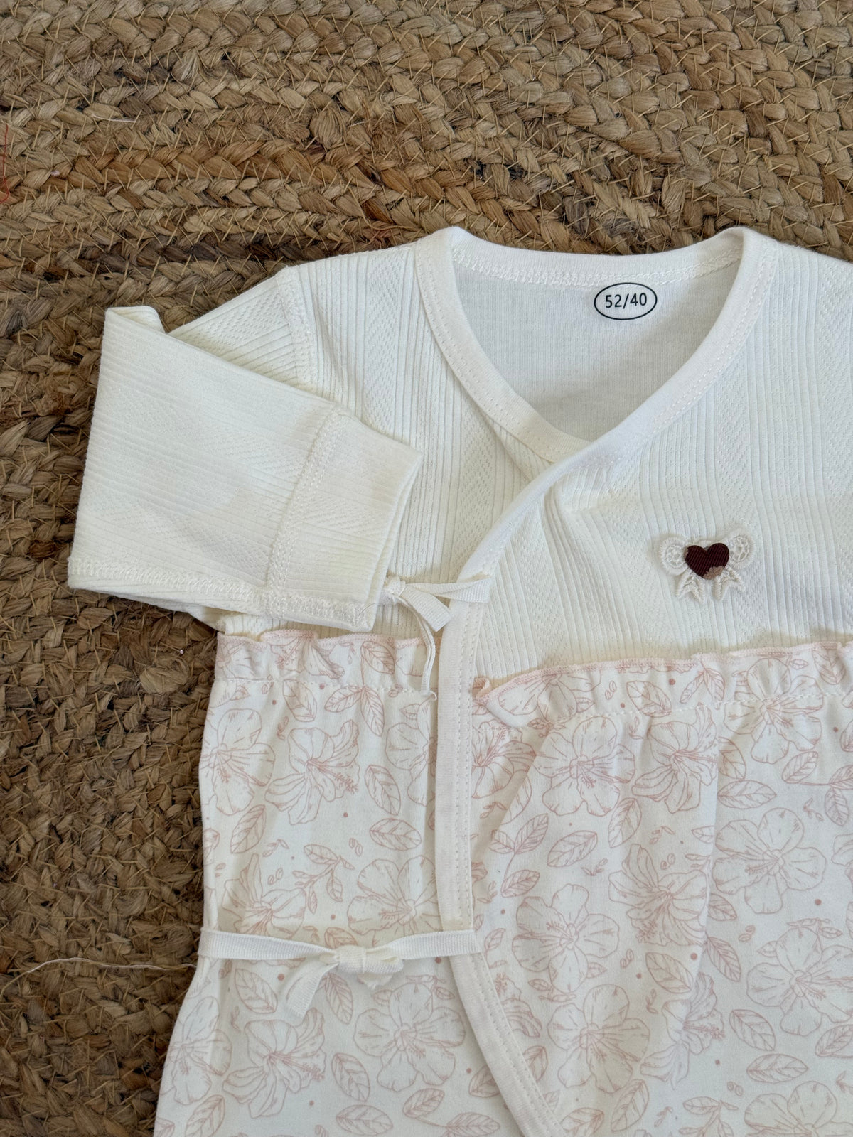 Floral Wrap-Style Baby Romper with Heart Embellishment