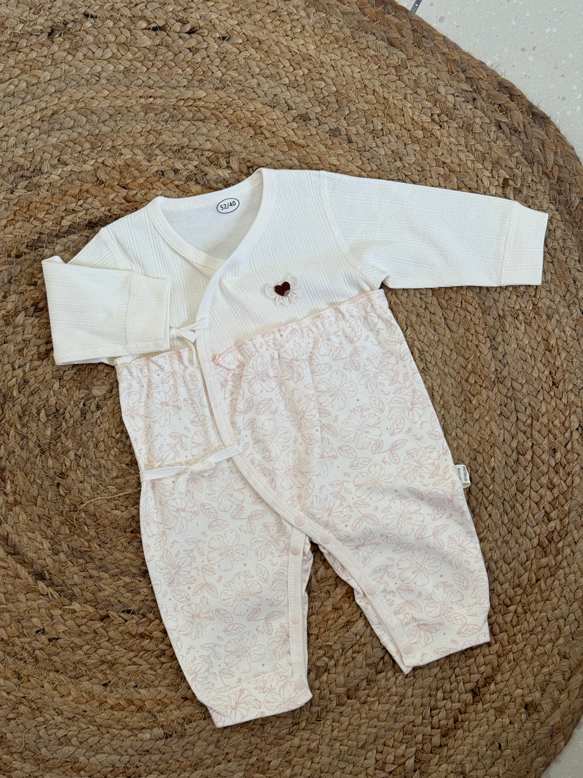Floral Wrap-Style Baby Romper with Heart Embellishment